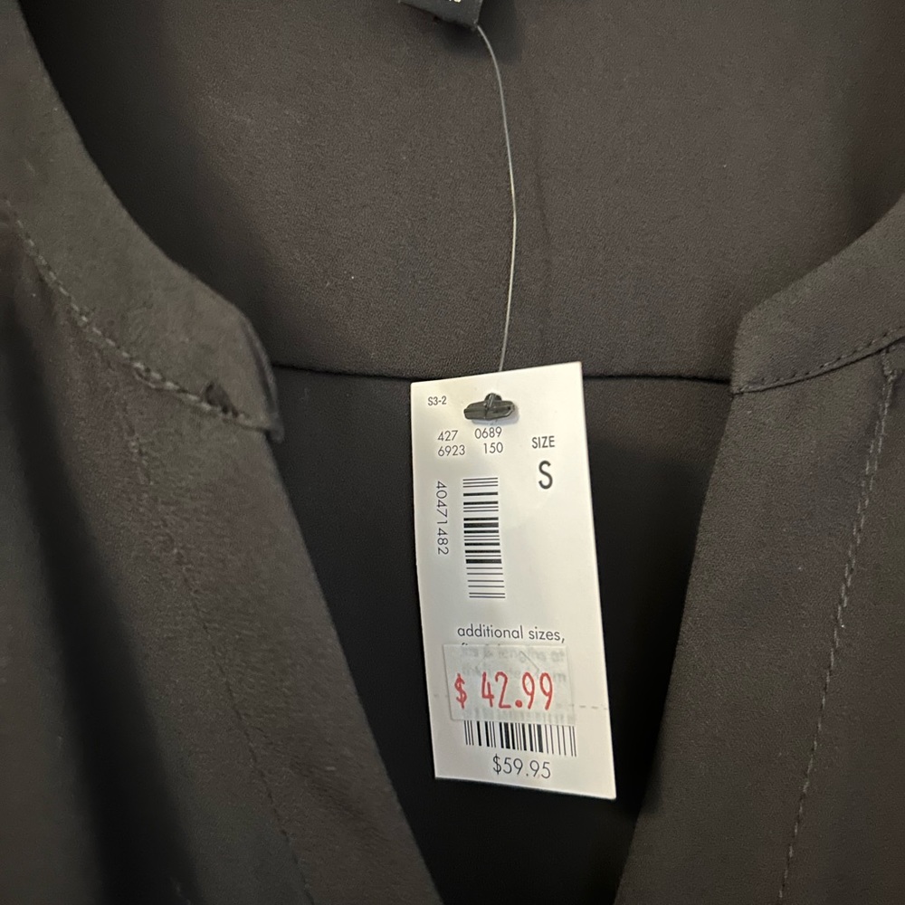 Black Tunic with good accent buttons and tie waist 100%Polyester